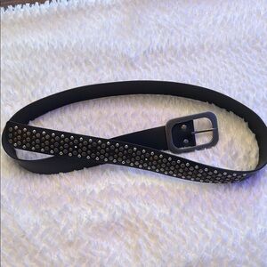 Black and Silver Belts with Distinctive Buckles